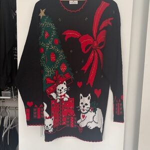 Festive Black Sweater with Red and Green Accents